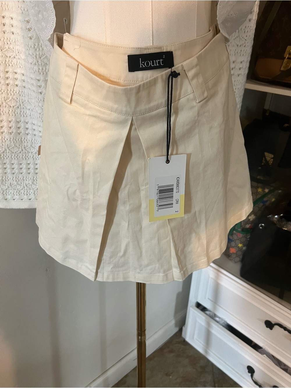 Kourt Cream Pleated Mini Skirt